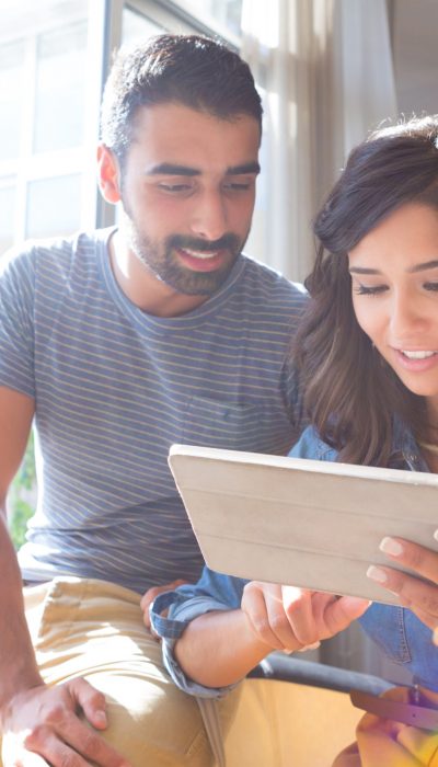 Couple using tablet